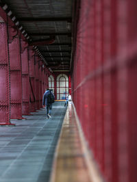 Woman walking in tunnel