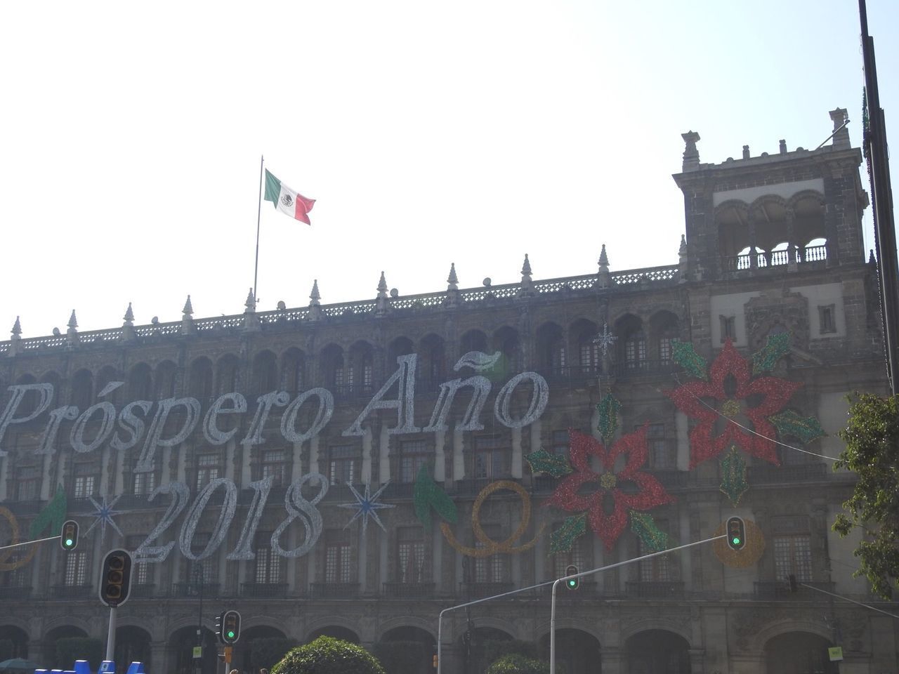 LOW ANGLE VIEW OF FLAG AGAINST BUILDING