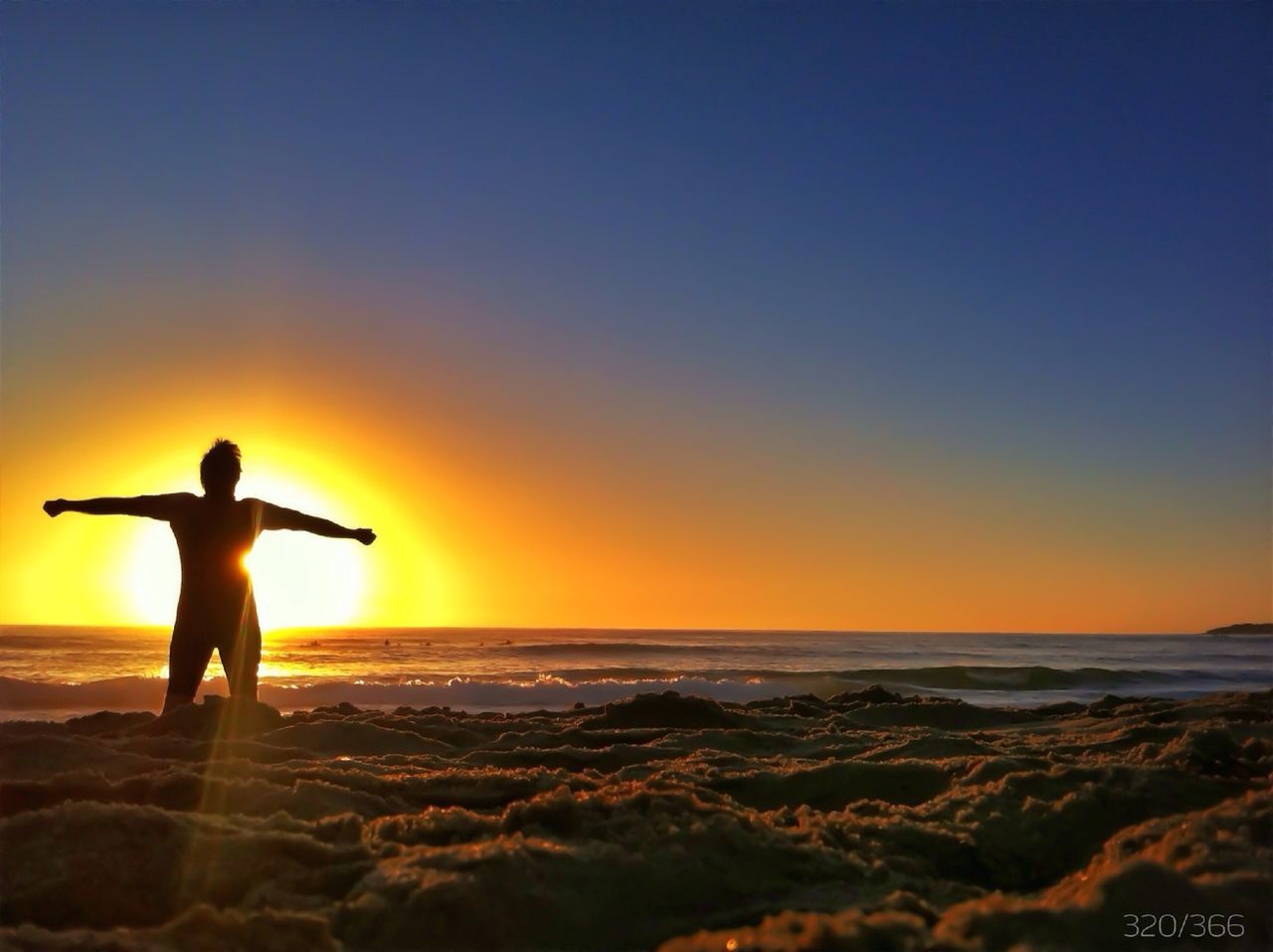 SCENIC VIEW OF SUNSET OVER SEA