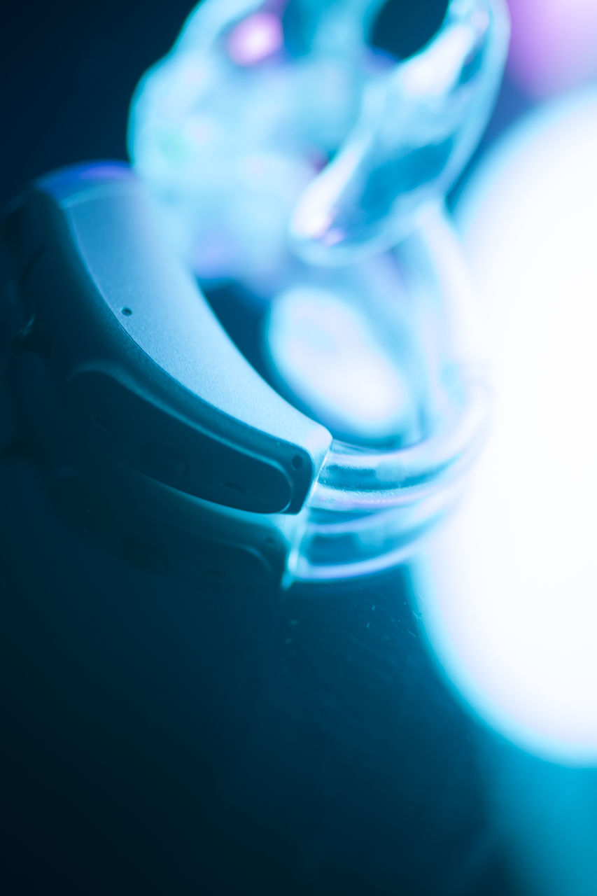 CLOSE-UP OF WATER BOTTLE IN GLASS