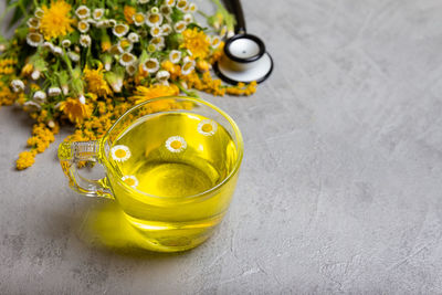 Hot chinese green tea. chamomile tea in glass cup.