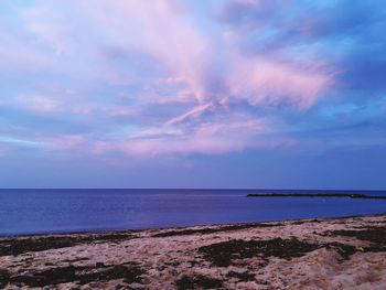 Scenic view of calm sea against sky