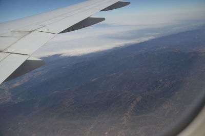 Aerial view of mountains against sky