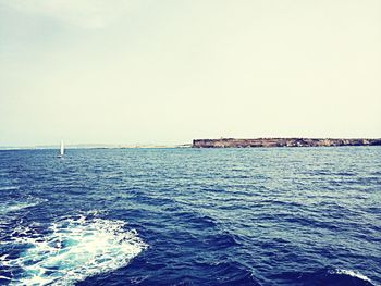 Boat sailing in sea