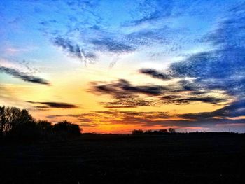 Scenic view of landscape at sunset