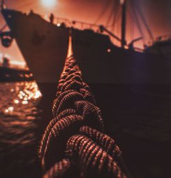 Close-up of rope against sky during sunset