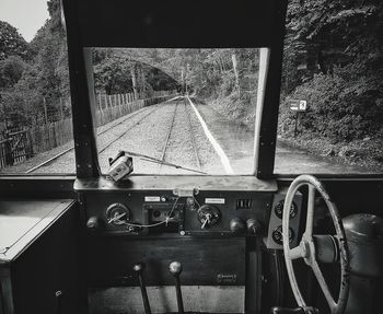 Close-up of train seen through window