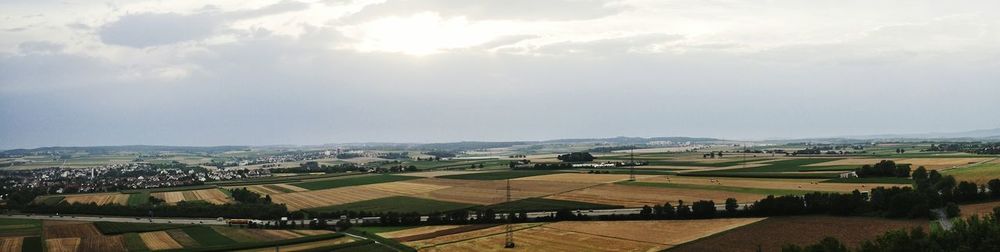 Aerial view of agricultural field against sky