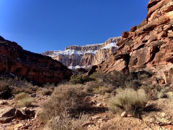 Scenic view of mountains against clear sky