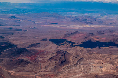 Aerial view of rocky mountains on sunny day