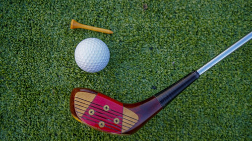 High angle view of golf ball on grass