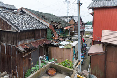 Houses against buildings in town