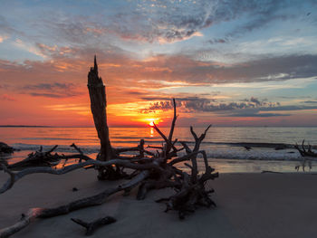 Scenic view of sea against sky at sunset