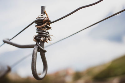 Low angle view of barbed wire