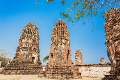 Low angle view of old ruins against sky