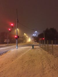 Illuminated street lights at night