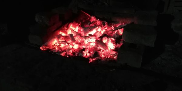 High angle view of fire in the dark