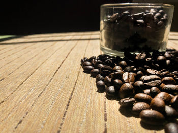 Close-up of coffee beans on table