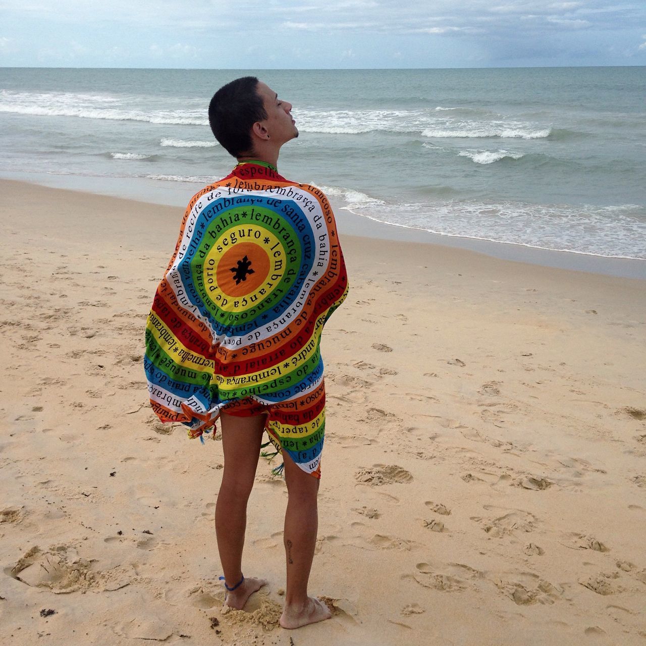 beach, sand, rear view, shore, sea, water, standing, leisure activity, casual clothing, full length, vacations, summer, wave, outdoors, nature, focus on foreground, beauty in nature, person, scenics