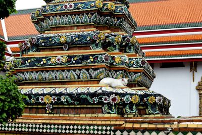 Low angle view of statues on building roof