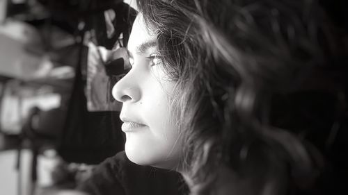 Close-up portrait of a girl looking away