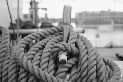 Close-up of rope tied to railing