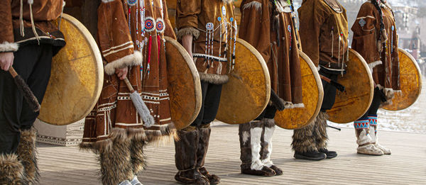 Folk ensemble performance in dress of indigenous people of kamchatka.