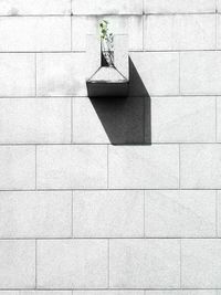 Statue against wall