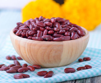 Close-up of roasted coffee beans on table