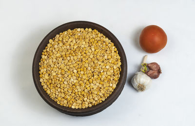 High angle view of food in bowl on white background