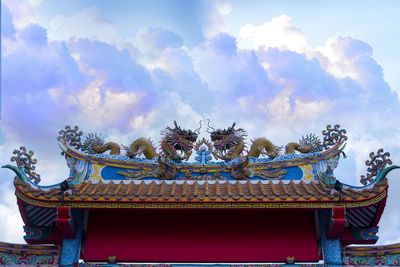 Low angle view of temple against sky