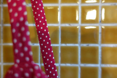 Close-up of water drops on floor against wall at home