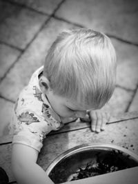 High angle portrait of boy playing outdoors