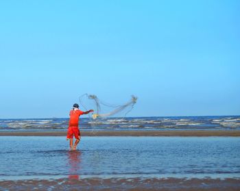 Scenic view of sea against clear sky