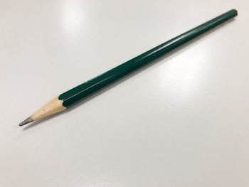 Close-up of pencils against white background