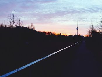 Road passing through forest