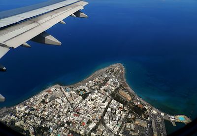 Aerial view of cityscape against sky