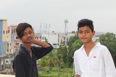 Portrait of teenage boys standing outdoors