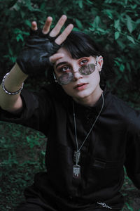Portrait of young man wearing sunglasses