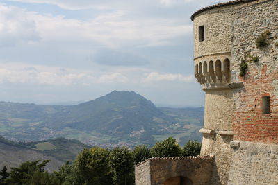 Built structures against mountain range