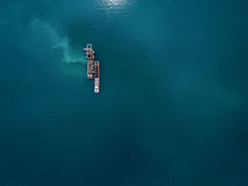 Aerial view of drilling rig in sea
