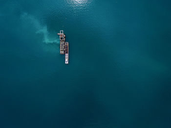 High angle view of boat floating on sea