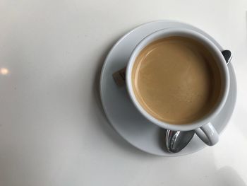 High angle view of coffee cup on table