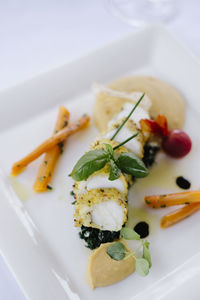 Close-up of served food in plate