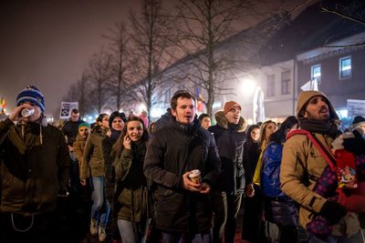 Group of people in winter at night