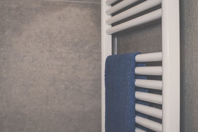 Towels heat up on modern design radiator in the bathroom towel ready to use after a bath or a shower