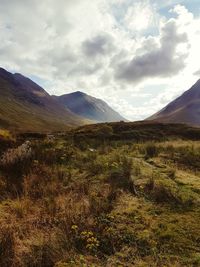 View of landscape against cloudy sky