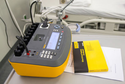 Close-up of telephone on table