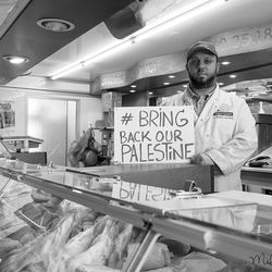 Portrait of man standing in store