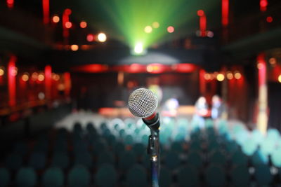 Close-up of microphone at stage theater